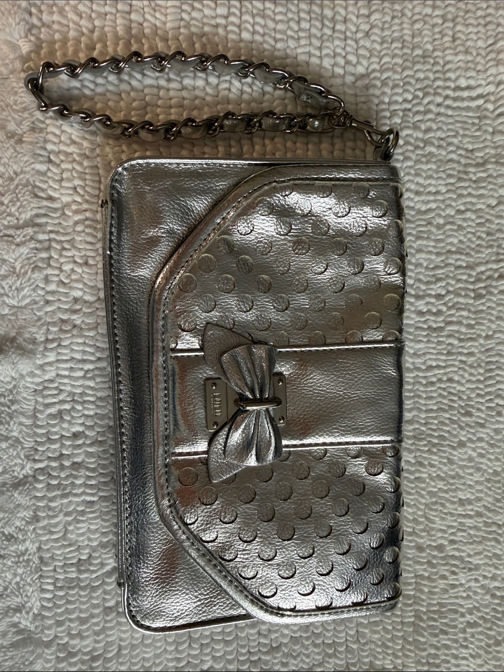 Metallic Silver Bow Accent Wristlet Clutch LULU